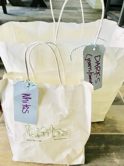 Game Changing Travel Hack - The Travel Tote. This girl's a genius! All traveling necessities in one place, ready to go any time. She has tons of hacks and a free printable checklist!!