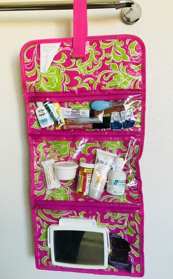 This ONE Travel Hack Will CHANGE YOUR LIFE - The Travel Tote. This post is a MUST-SEE! All traveling necessities in one place, ready to go any time. Tons of hacks! Free printable checkli