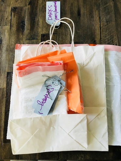 Game Changing Travel Hack - The Travel Tote. This post is a MUST-SEE! All traveling necessities in one place, ready to go any time. Tons of hacks within this post. Free printable checklist!!