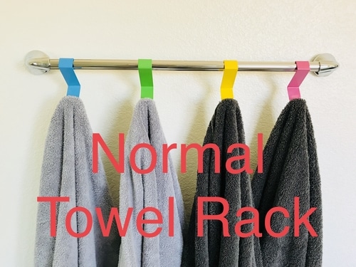 Travel Hack! Create Space to Hang Everyone's Towels - See post for these MUST-HAVE colored hooks to pack in your travel bag for hanging towels while on vacation. More awesome travel hacks in this post!