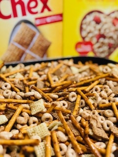 The Yummiest Homemade Non-Sugary Snack for the Holidays - this homemade Chex mix is A-MAZ-ING and SO EASY!!!! Dump all the boxes in, throw in the seasoning, stir it up, and bake. LOVE THIS STUFF! -PlanForAwesome