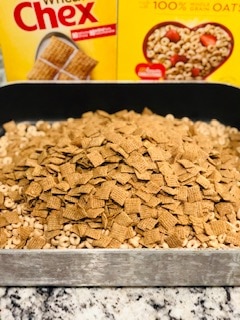 The Yummiest Homemade Non-Sugary Snack for the Holidays - this homemade Chex mix is A-MAZ-ING and SO EASY!!!! Dump all the boxes in, throw in the seasoning, stir it up, and bake. LOVE THIS STUFF! -PlanForAwesome