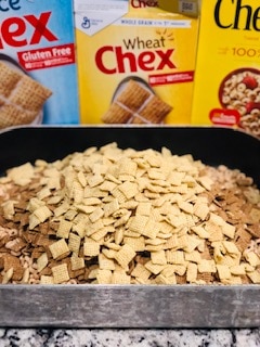 The Yummiest Homemade Non-Sugary Snack for the Holidays - this homemade Chex mix is A-MAZ-ING and SO EASY!!!! Dump all the boxes in, throw in the seasoning, stir it up, and bake. LOVE THIS STUFF! -PlanForAwesome