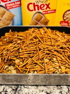 The Yummiest Homemade Non-Sugary Snack for the Holidays - this homemade Chex mix is A-MAZ-ING and SO EASY!!!! Dump all the boxes in, throw in the seasoning, stir it up, and bake. LOVE THIS STUFF! -PlanForAwesome