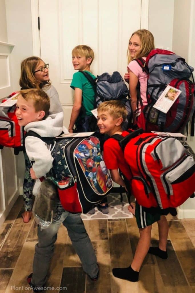 kids with 72 hour backpacks on