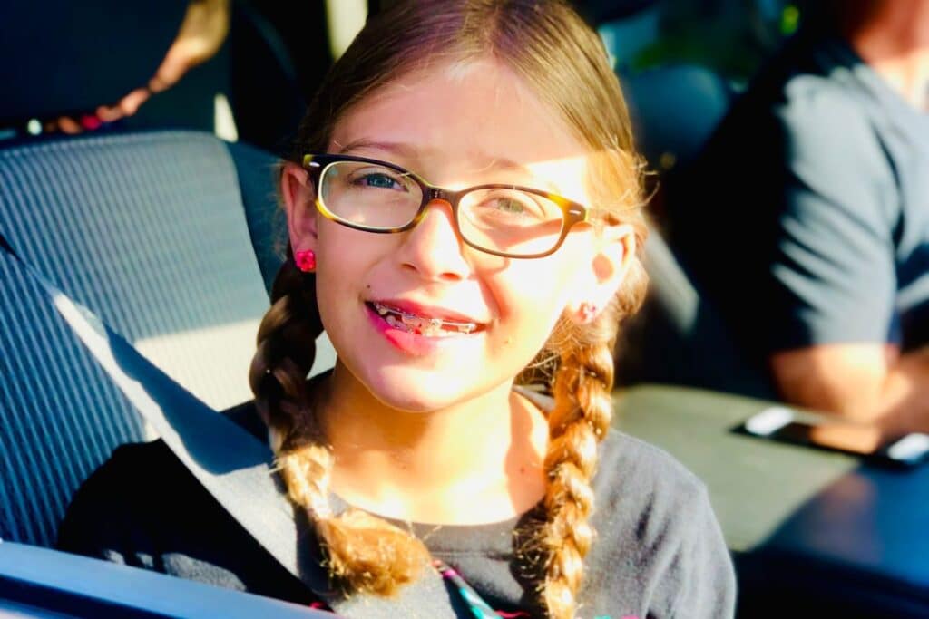 girl wearing affordable glasses from zenni optical.