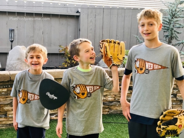 Happy baseball boys with their new shirts from their baseball subscription box!  The BEST GIFT EVER for Baseball Lovers (plus a $20 off coupon) - seriously the coolest and the easiest gift idea for baseball lovers and players!  A surprise box full of baseball gear, apparel, training aids, accessories, and snacks - what's not to love?!  #baseballgiftideas #baseballmom