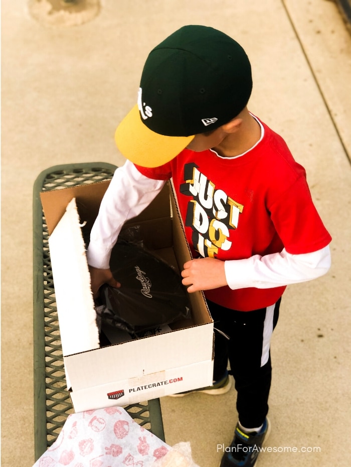 This is seriously the coolest gift my son has gotten!  A surprise box full of baseball gear, apparel, training aids, accessories, and snacks - what's not to love?! #baseballgiftideas #baseballmom