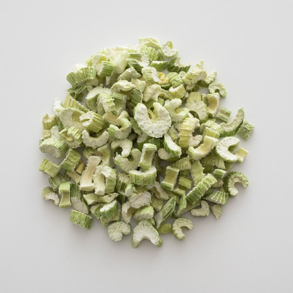 pile of freeze dried celery slices on white table