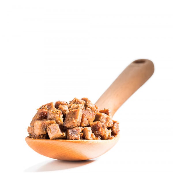wooden spoon full of diced beef