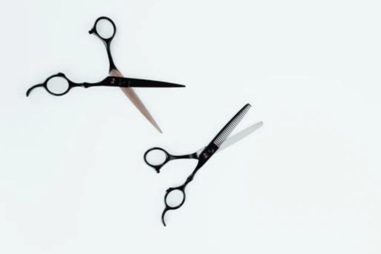 pair of haircutting scissors and texturing shears