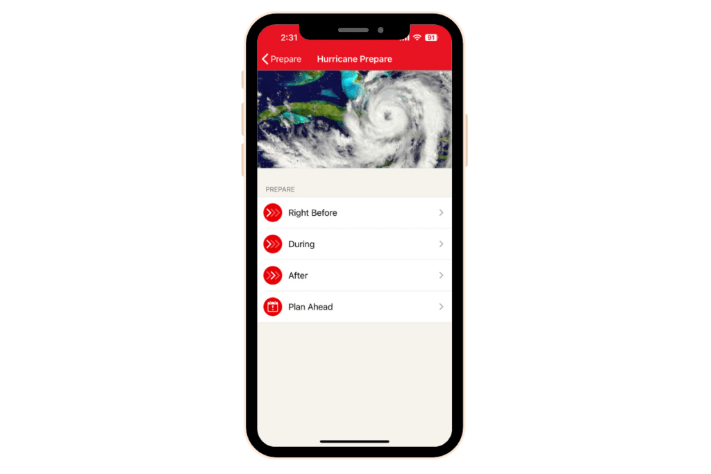 mobile phone showing red cross hurricane app.