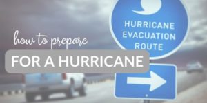car driving past a hurrican evacuation sign