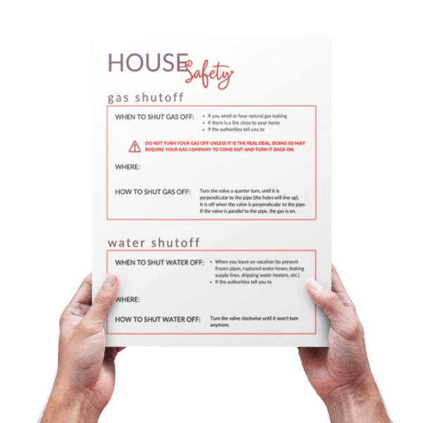 Two hands holding the free House Safety Utility Shutoff Printable