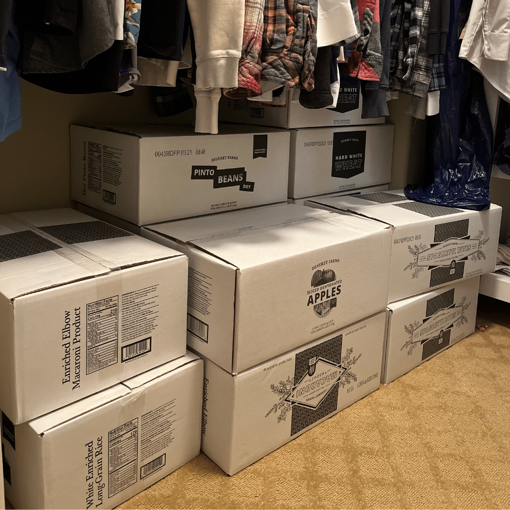 Boxes of food storage on a closet floor.