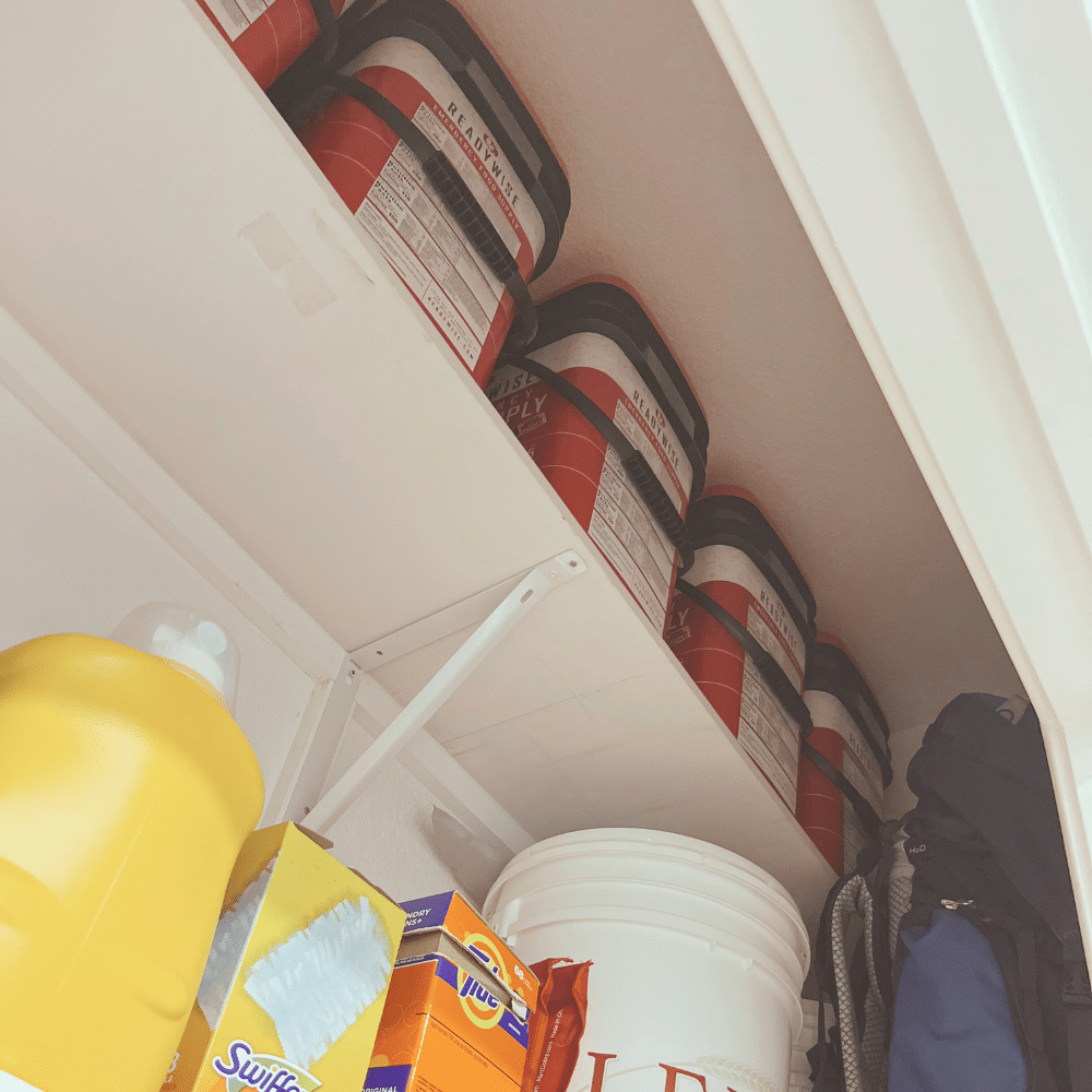 Food storage stored on laundry room shelves.