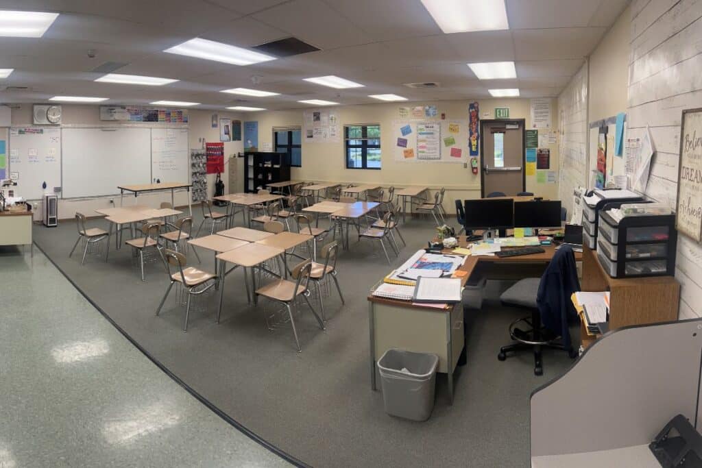 empty desks in a classroom.